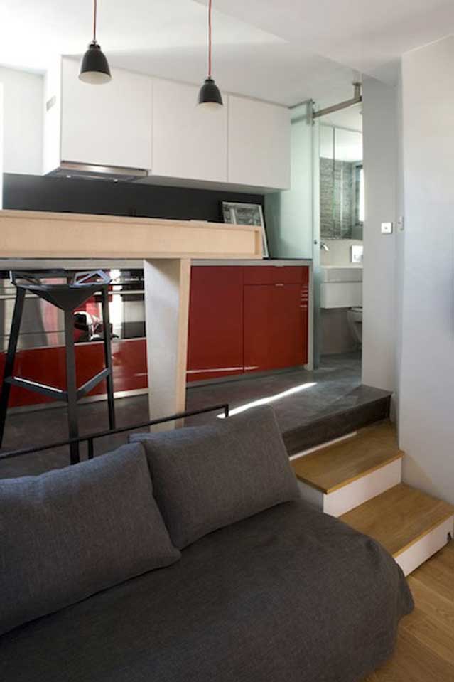 Micro Apartment in Paris couch and stairs