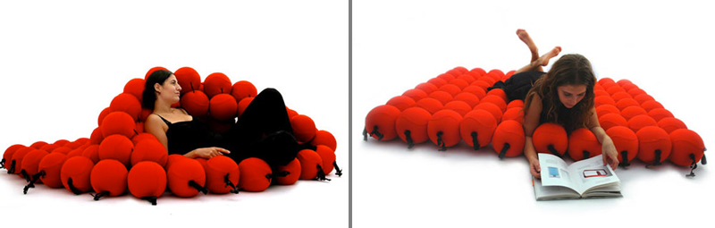 2 images of the red Feel Seating deluxe by Animi Causa with a woman lying down on top of it