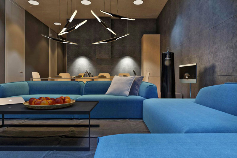 Blue sofa and Interior design of the living room at the Chair House by Igor Sirotov