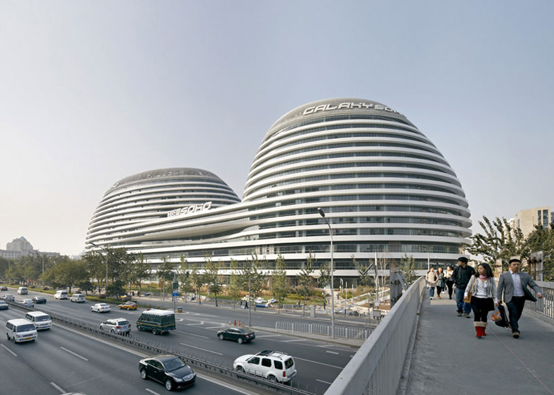 Exterior view during the day of the Galaxy SOHO Complex in Beijing designed by Zaha Hadid
