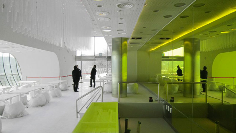 White and lime green interior design of the Jeongok Museum South Korea Prehistory Museum by X-TU Architects
