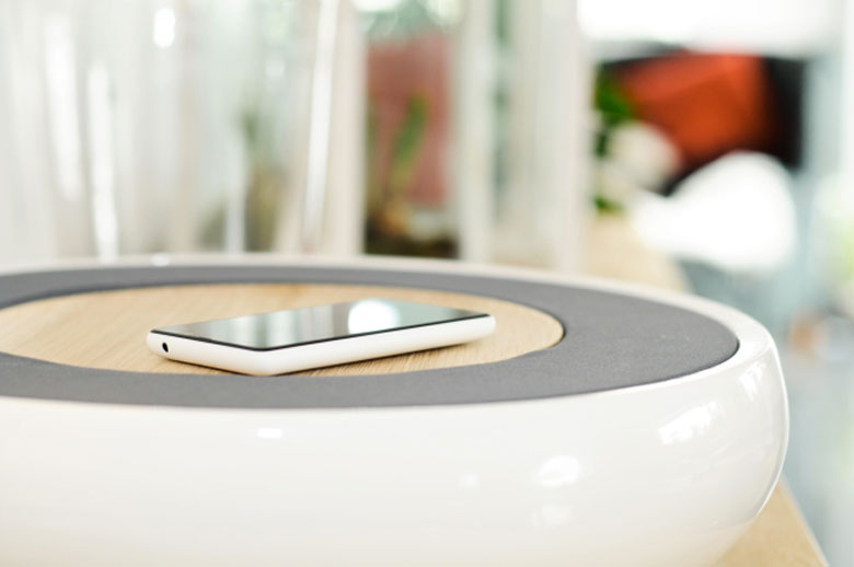 Smartphone on top of the Ceramic Speaker for Smartphones by Victor Johansson