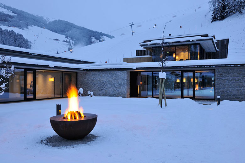 Fire pit at the Hotel Wiesergut in Hinterglemm Austria by Gogl Architekten