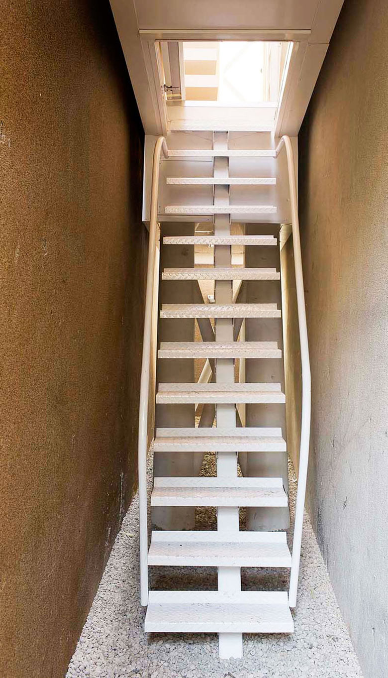 Metal staircase of the Keret House the World's Narrowest Home in Warsaw by Jakub Szczesny