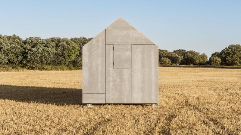 Side view of the aph80 Portable Concrete Prefab House by Abaton