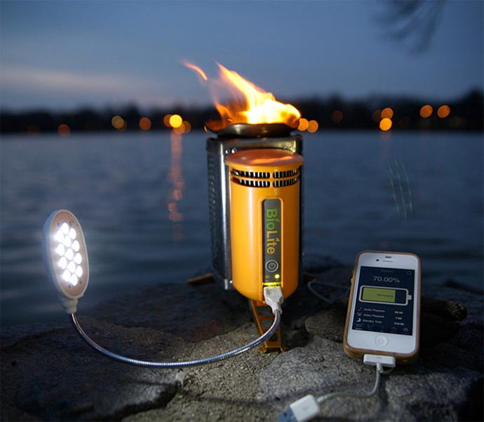 BioLite Stove - Electricity Generating Stove being used to charge a phone and power a light
