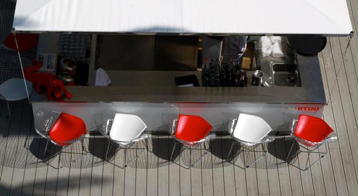 White and red bar chairs at the KUBE Hotel Gassin in Saint-Tropez