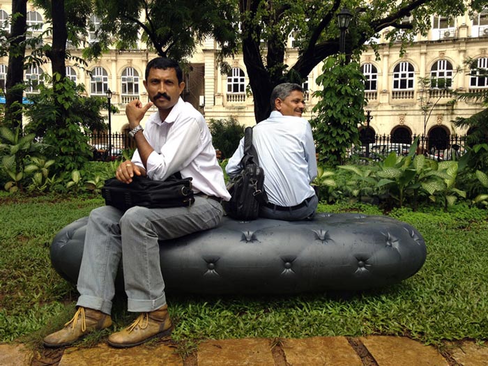 2 men sitting on the Water Bench in Mumbai