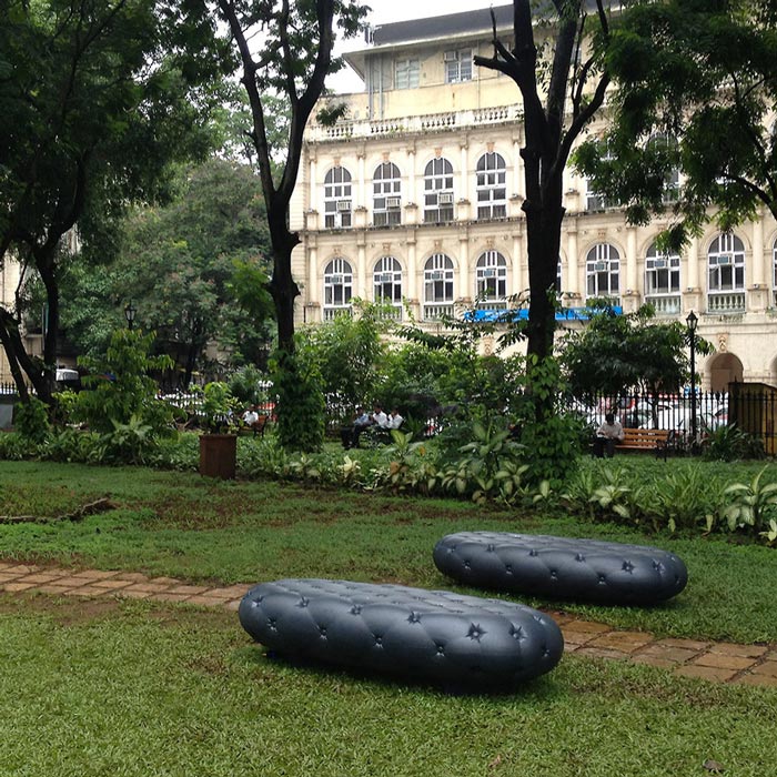 2 Black Water Benches in a park in Mumbai