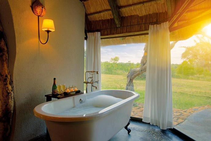 Indoor bathtub with a view at Leopard Hills