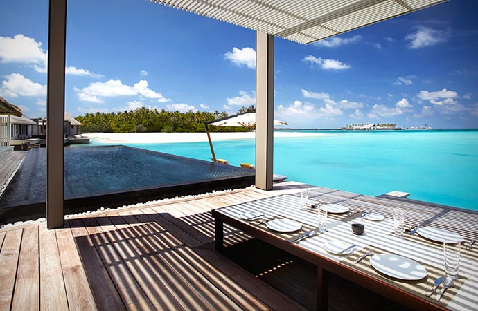 Dining by the sea at Cheval Blanc resort in the Maldives