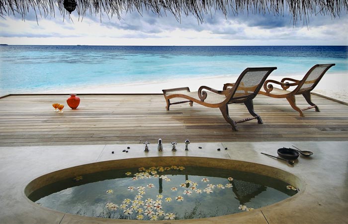 Room and bath at Kandolhu Island in the Maldives
