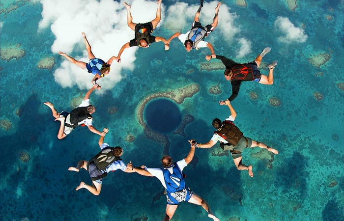 Skydiving above Great Blue Hole in Belize