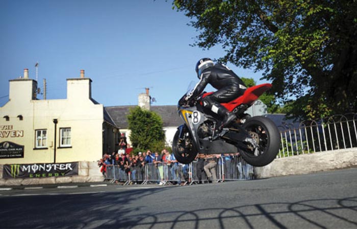 Isle of Man TT modern racer mid air