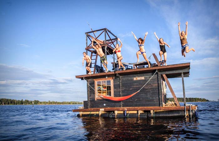 Jumping off the Finnish floating sauna