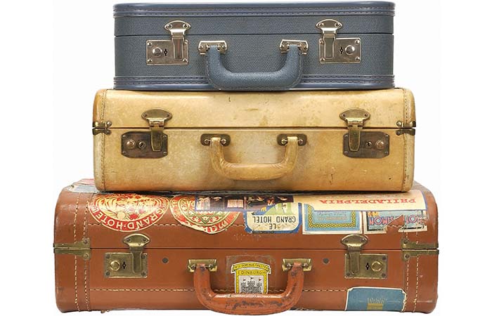 3 Vintage Suitcases With Stickers On Them