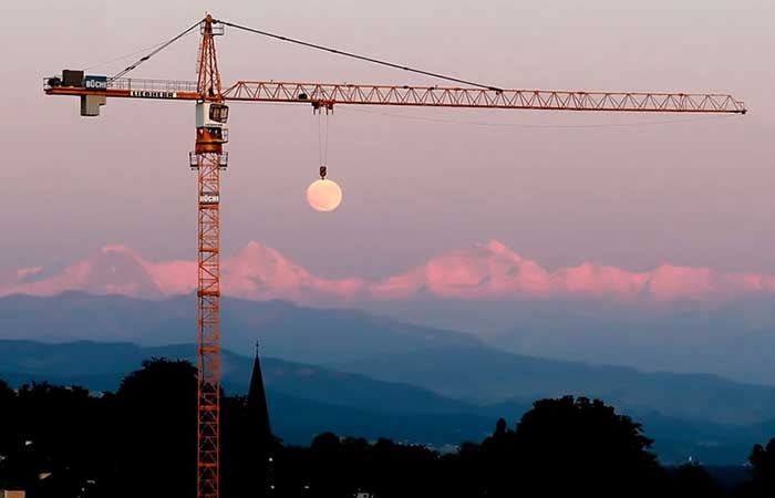 A crane holding the moon