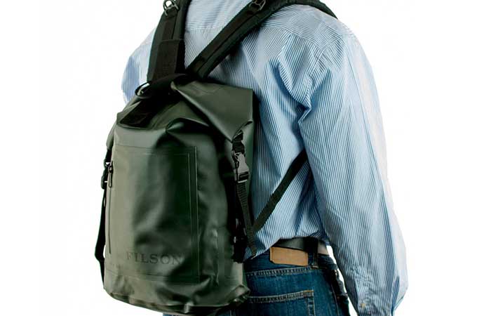 A man wearing Dry Day Backpack
