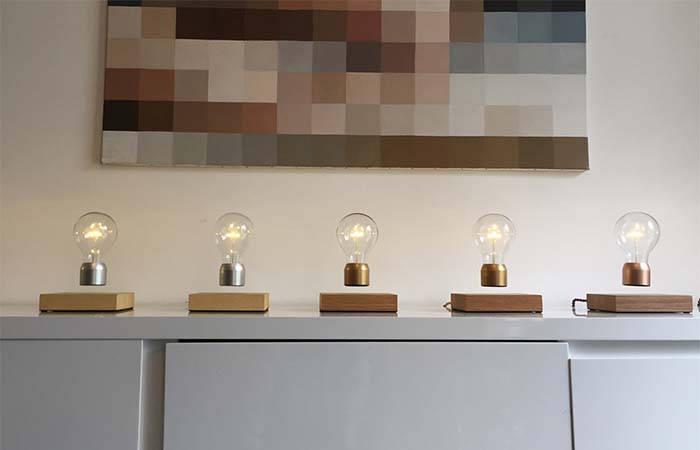 Five Flyte Light Bulbs Placed On The White Shelf