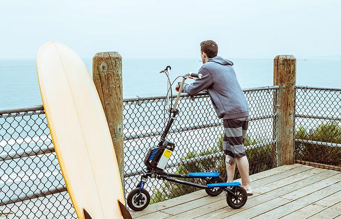 A guy with Freedom Electric Stand Up Trikke