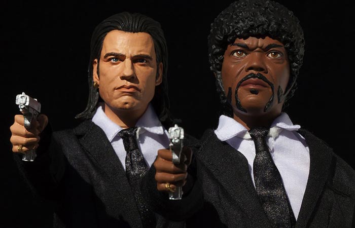 Vincent Vega and Jules Winnfield action figures pointing their guns, front view, upper body.
