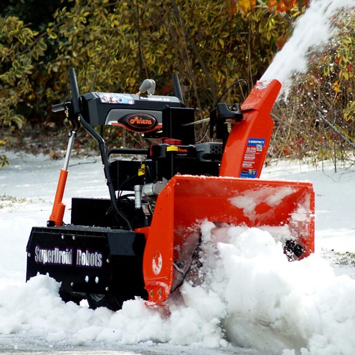 Snow Blower photographed while cleaning snow. 