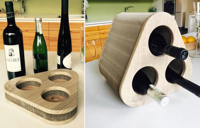 Deck Wine Holder on a kitchen worktop, closed and empty, and extended and filled with three wine bottles.
