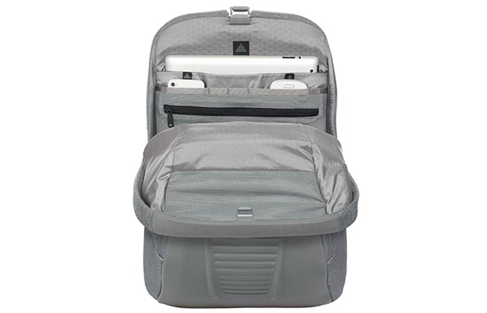 North Face Access Pack, grey, half open, with a white laptop and two phones in inside pockets. On a white background.