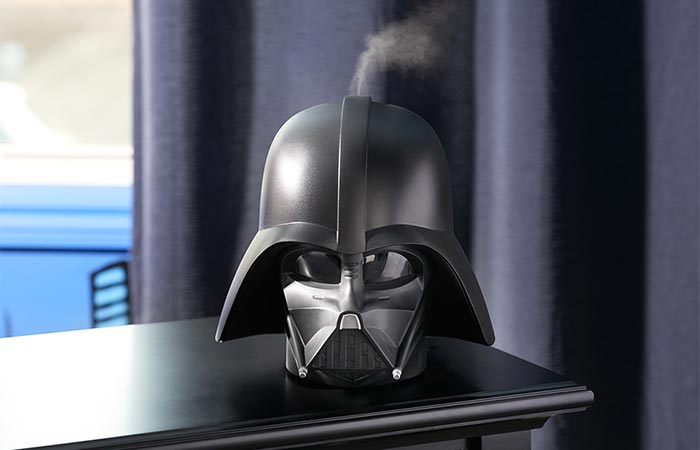 Darth Vader Humidifier Placed On A Black Table