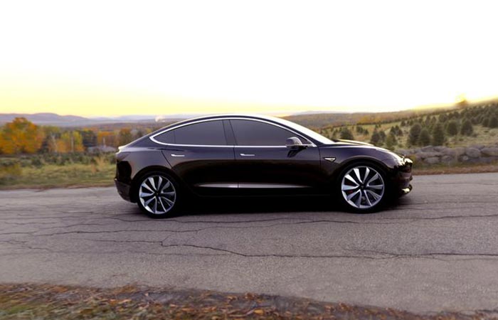 Black Tesla Model 3 On The Road