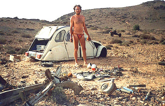 Emile Leray Next To His Broken Car In The Desert