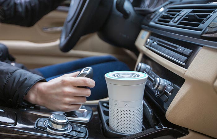 Wynd Personal Air Purifier Placed Inside A Car