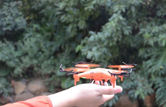 GPTOYS F51C RC Quadcopter being held in someone's hand