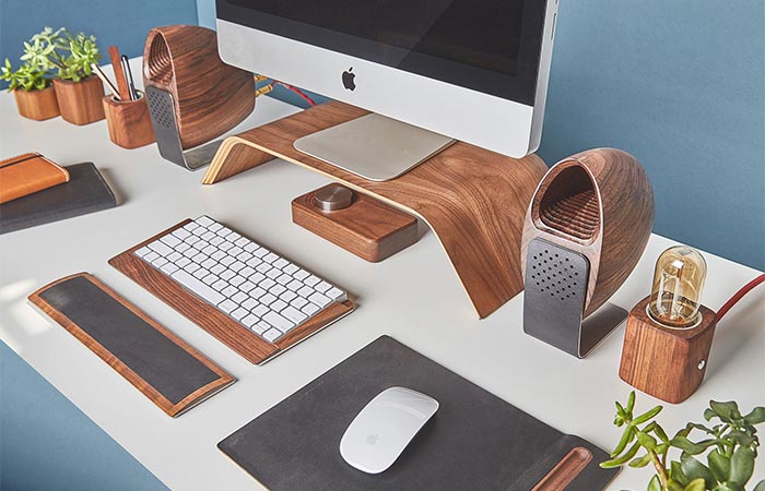 Grovemade Walnut Speakers On The Desk With Other Grovemade Products