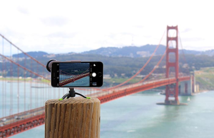 Smartphone a bracket taking a photo of the Golden Gate bride with the ExoLens on a tripod