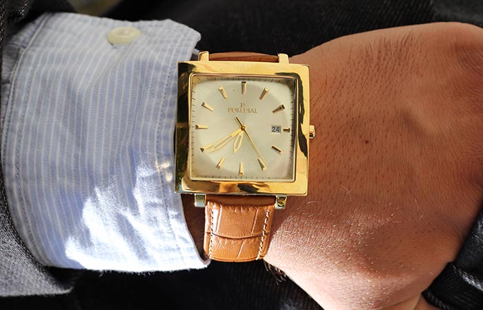 Puredial Square Legacy Gold on a man's wrist