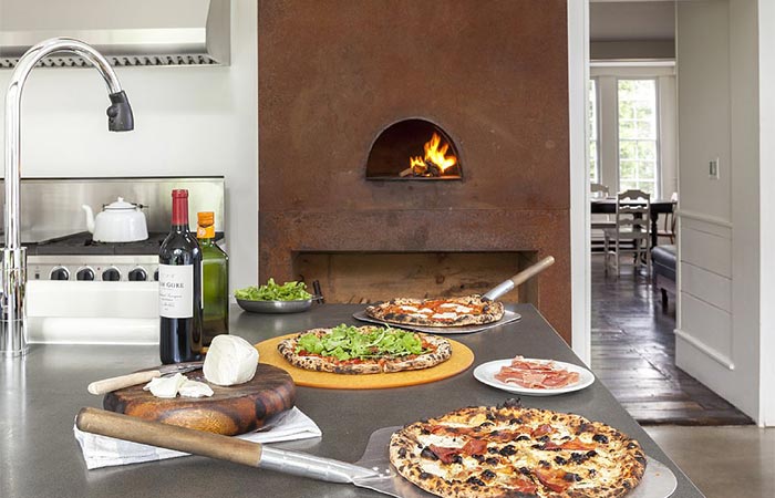 The Floating Farmhouse Fireplace And Pizza In The Kitchen