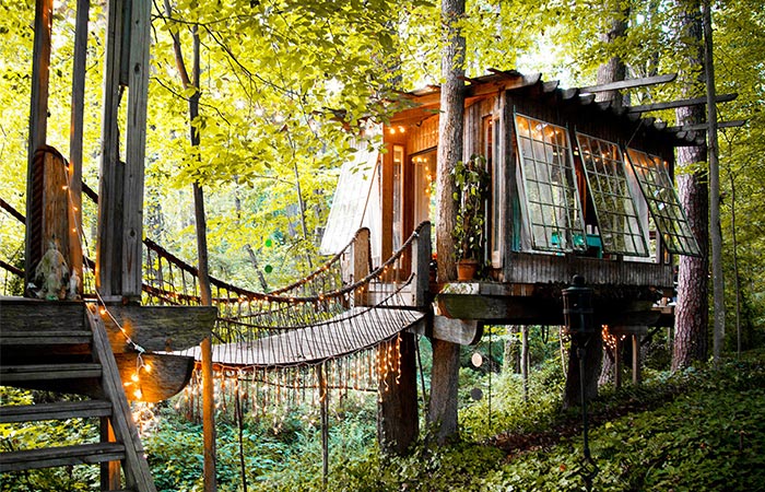 a treehouse in the woods