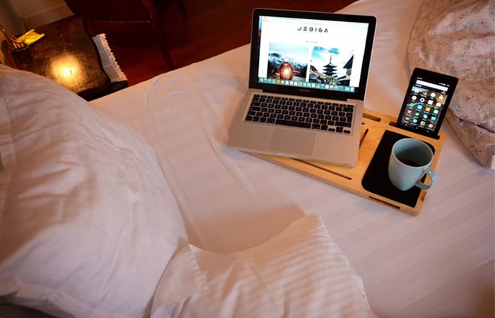 LapPad GO+ with gadgets on the bed