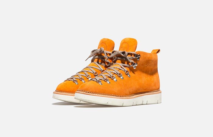 a pair of orange hiking boots