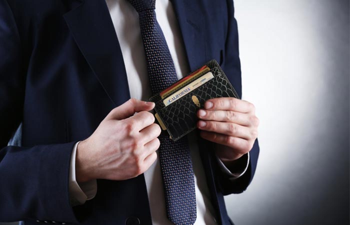 Man in suiting using the Inscribe Wallet
