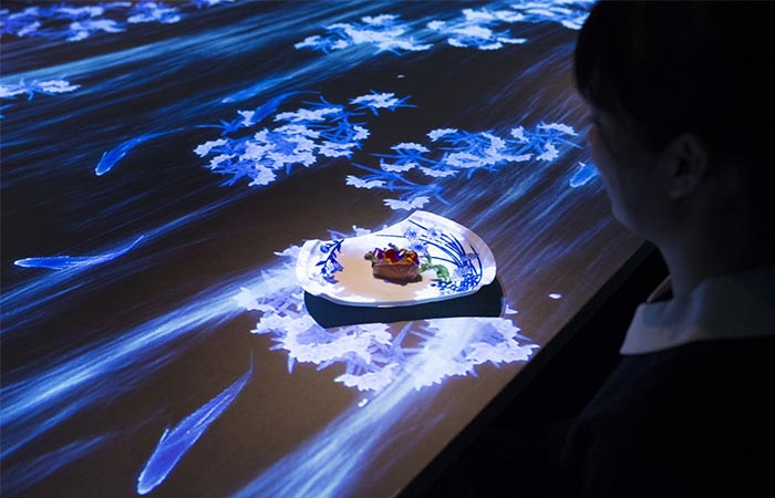 a food plate on a table covered with a light installation
