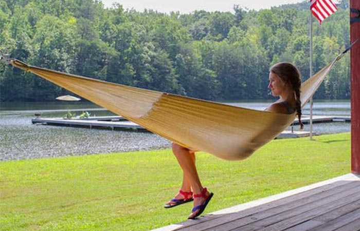Girl using the Weatherproof Big Sur Hammock at a lake