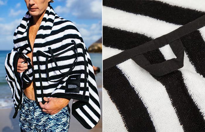 two images or stripy black and white Finisterre beach towel