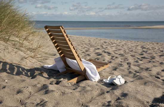 Skagerak Teak Dania Beach Chair displayed at the beach