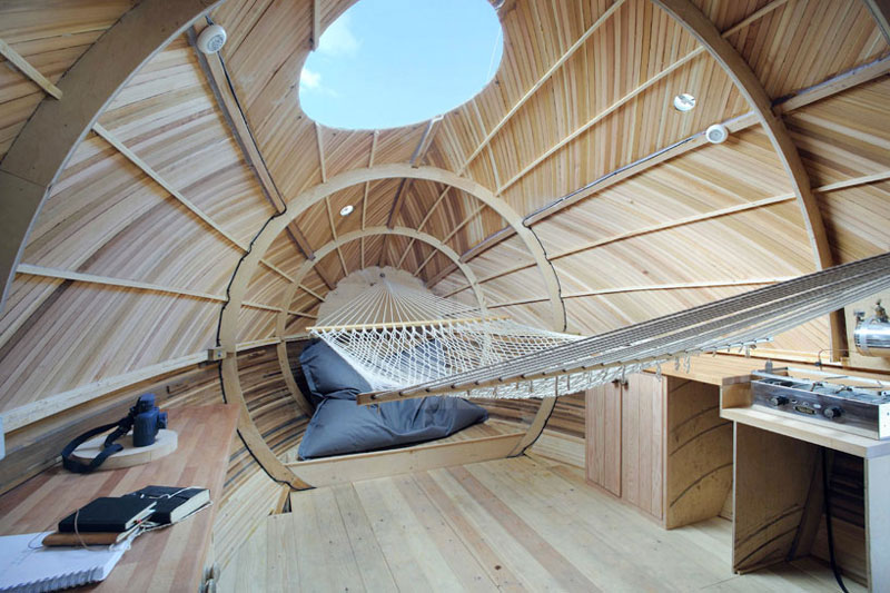 interior view of the front of the Exburry Egg with wooden wall panel and skylight