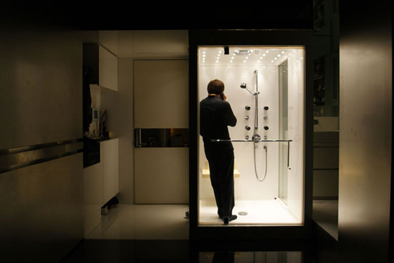 Gary Chang in the shower of his Hong Kong micro apartment