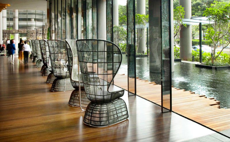 seats lined up near the windows at the Parkroyal Singapore