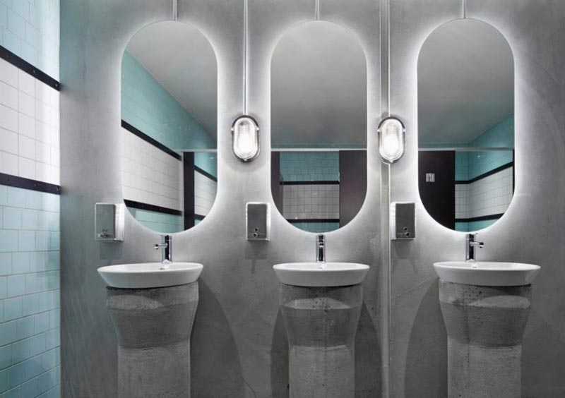 Bathroom sink and mirrors at Prahran Hotel