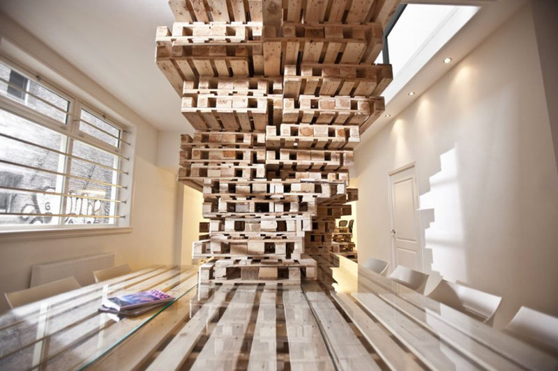 Stacks of pallet at the Brandbase Pallet Office by MOST Architecture